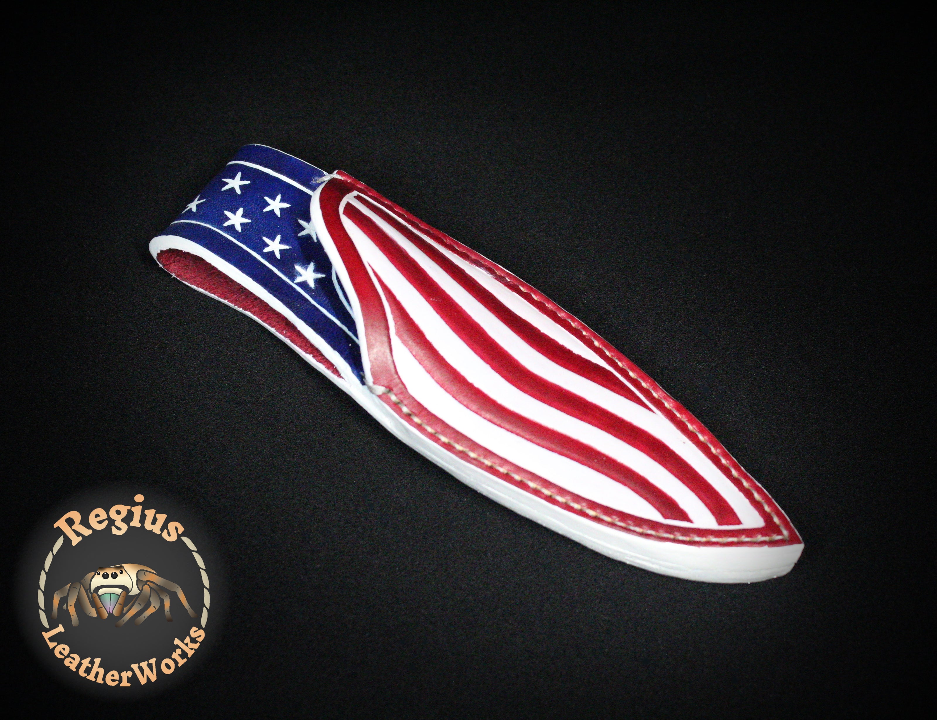Leather knife sheath with an American flag design and coloring.
