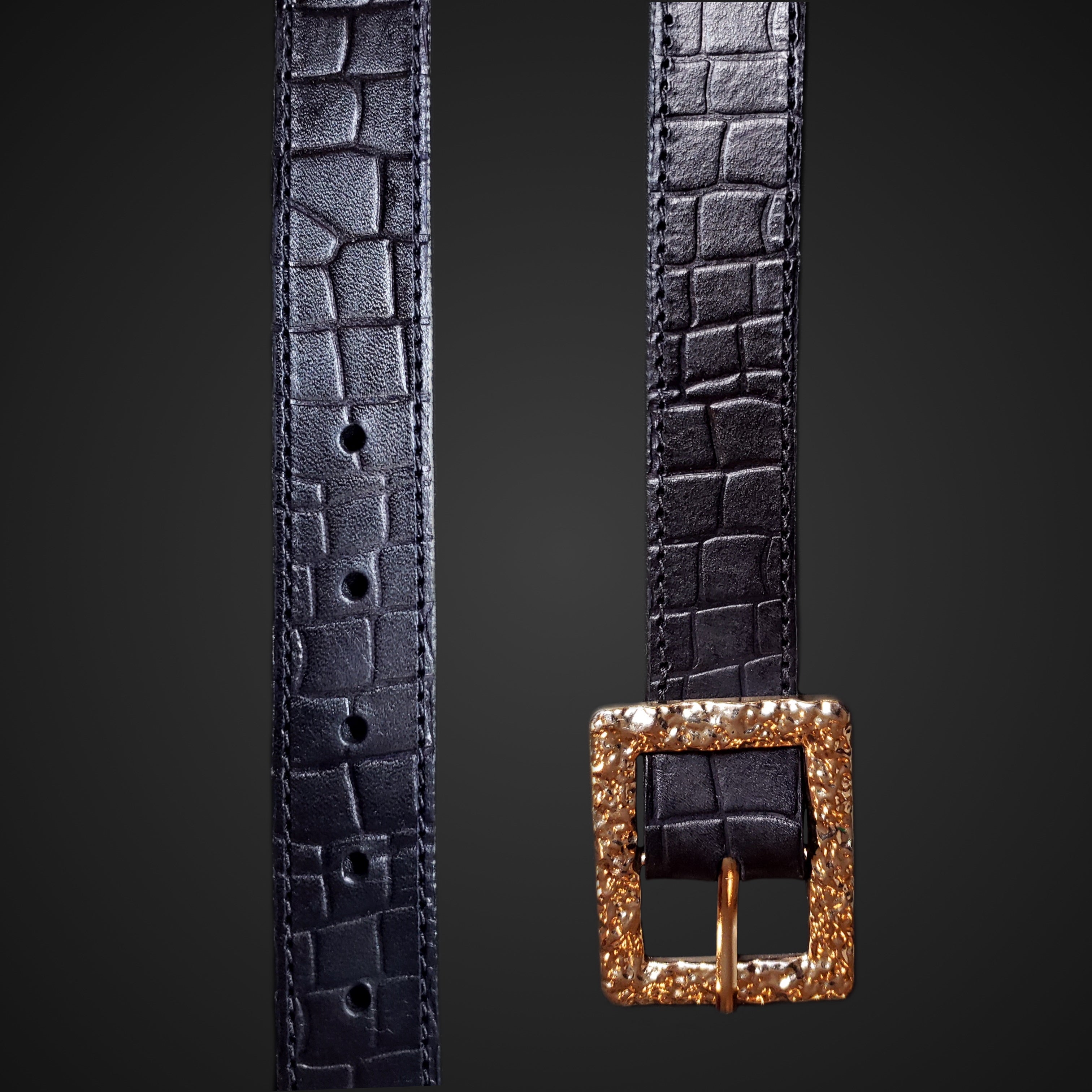 Black leather belt with a gator hide texture and a gold buckle.
