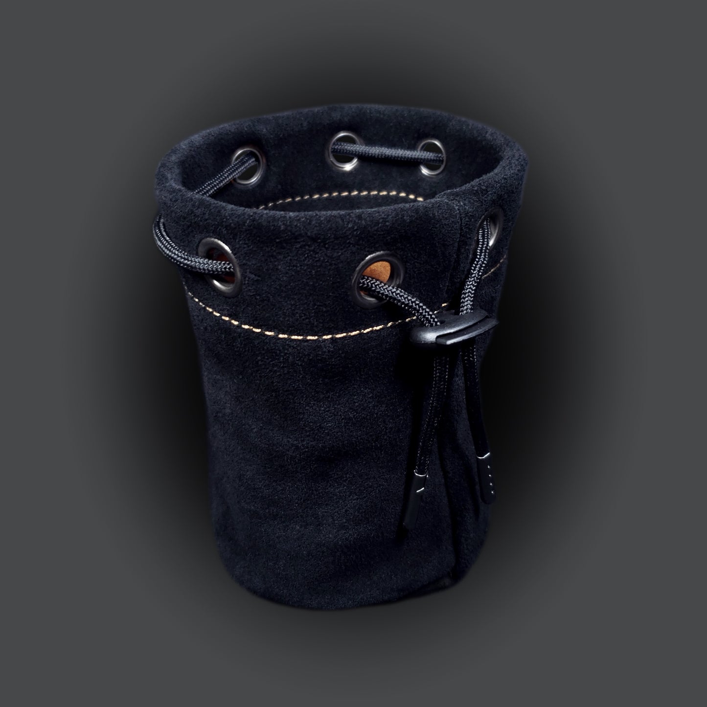 Black suede leather pouch with a brown satin interior and black drawstring.