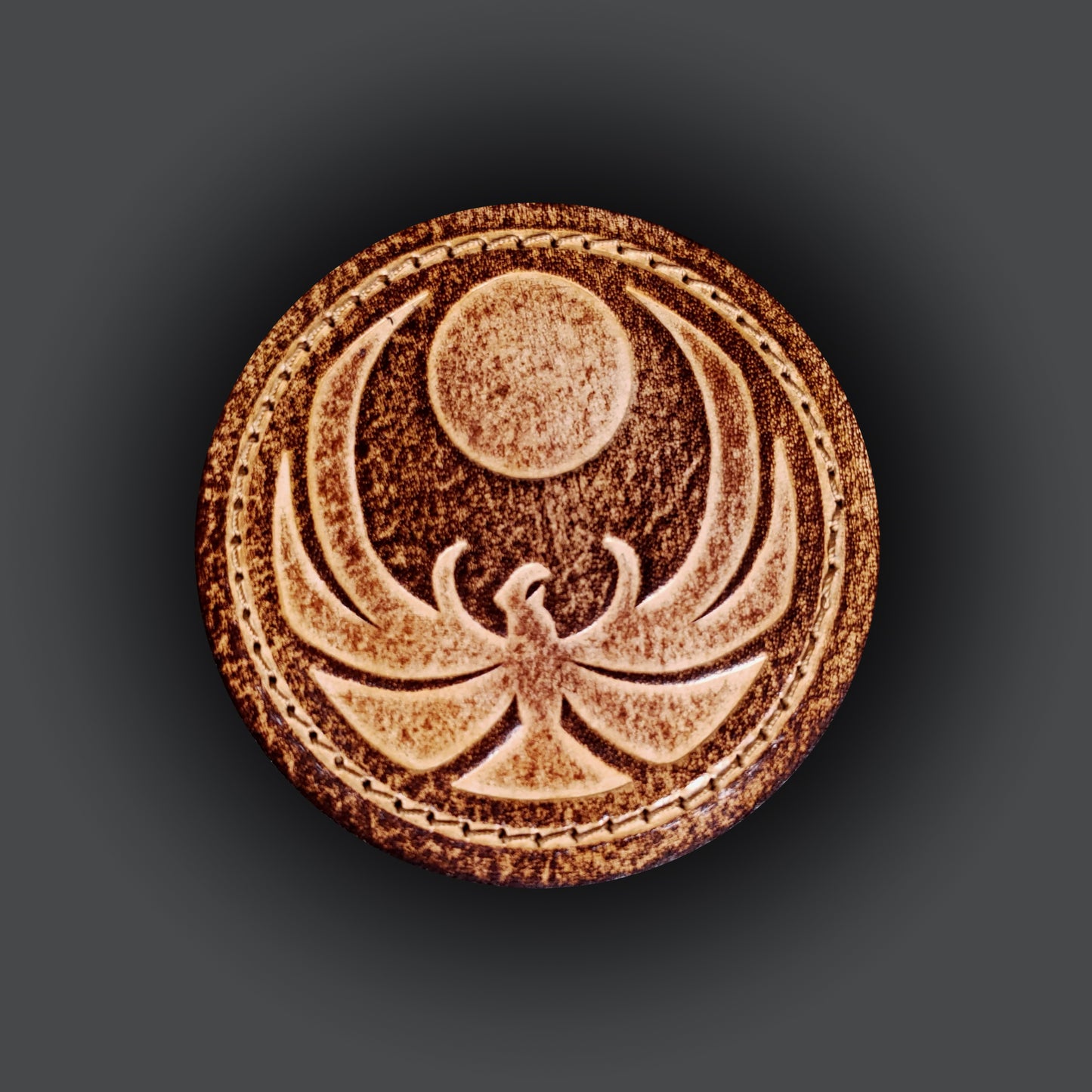 Brown leather velcro patch embossed with the Skyrim nightingale symbol from the Elder Scrolls franchise.