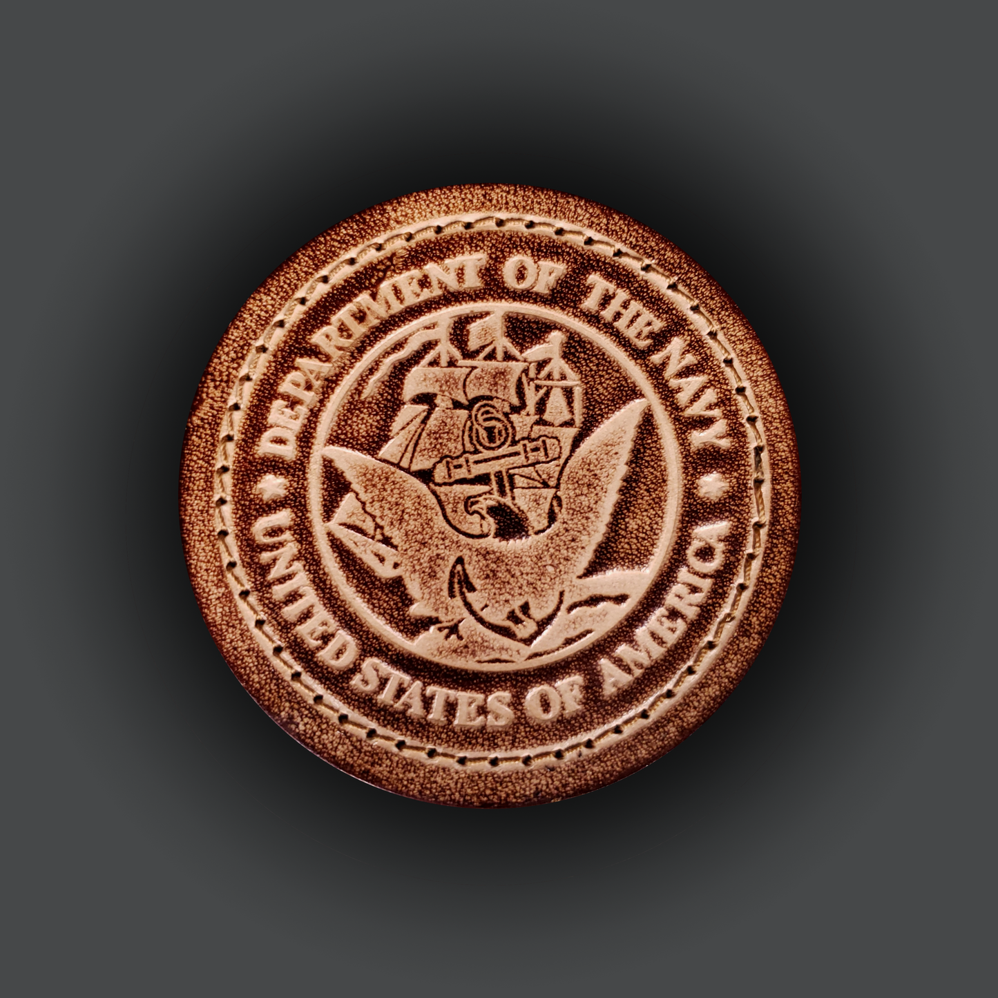 Brown leather velcro patch featuring the United States Navy emblem.