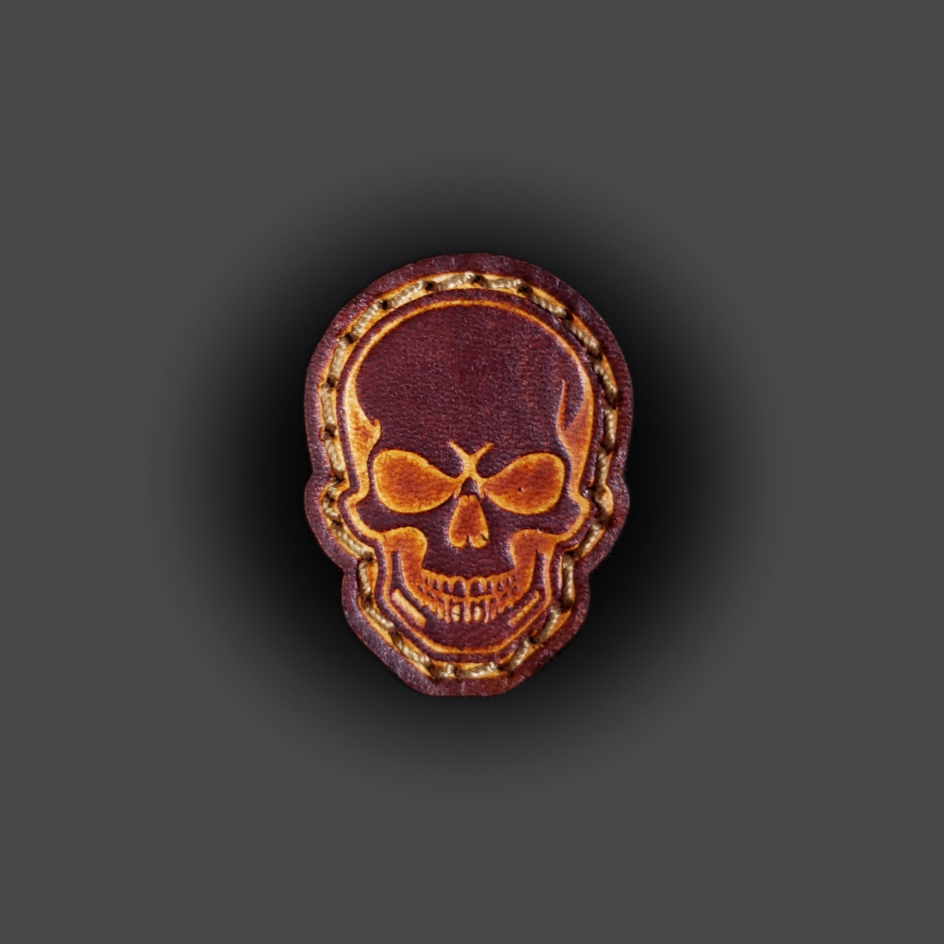 Small leather velcro patch embossed with a skull.