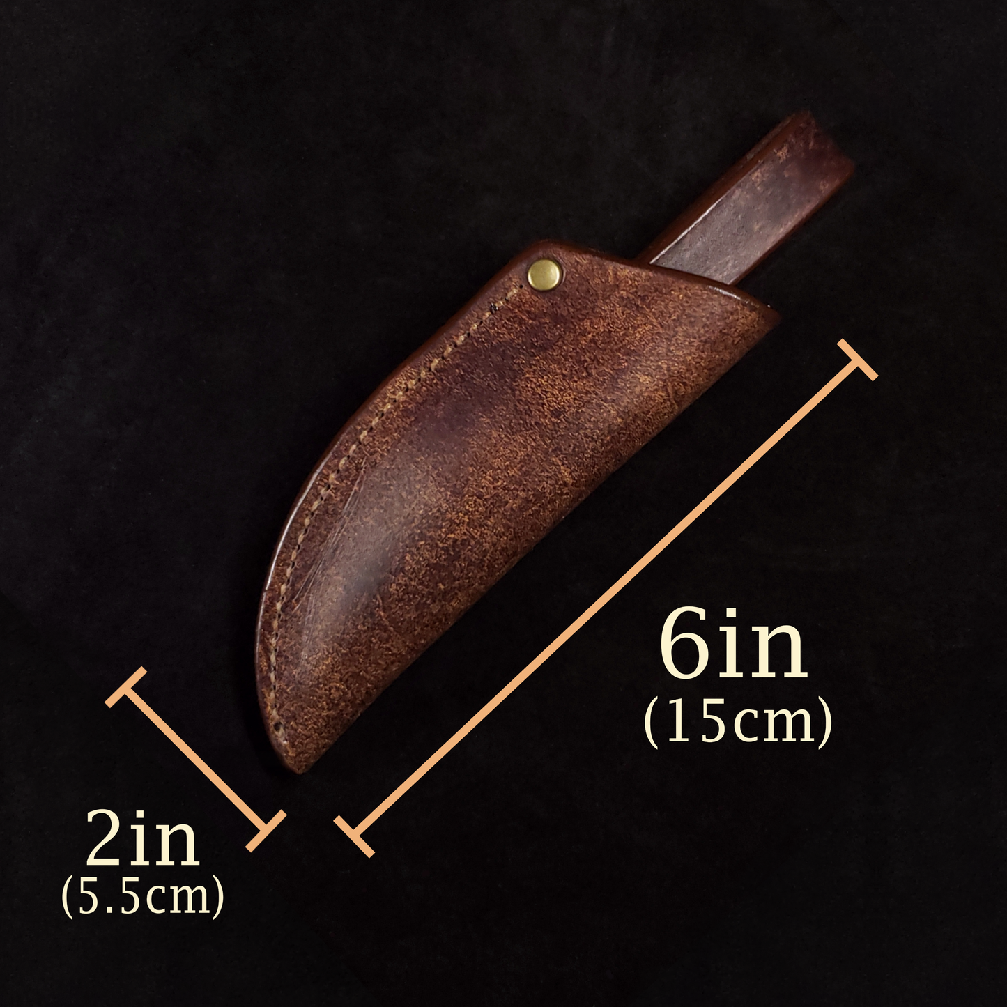 Brown leather knife sheath on a black background with graphics showing a six inch length and two inch width.